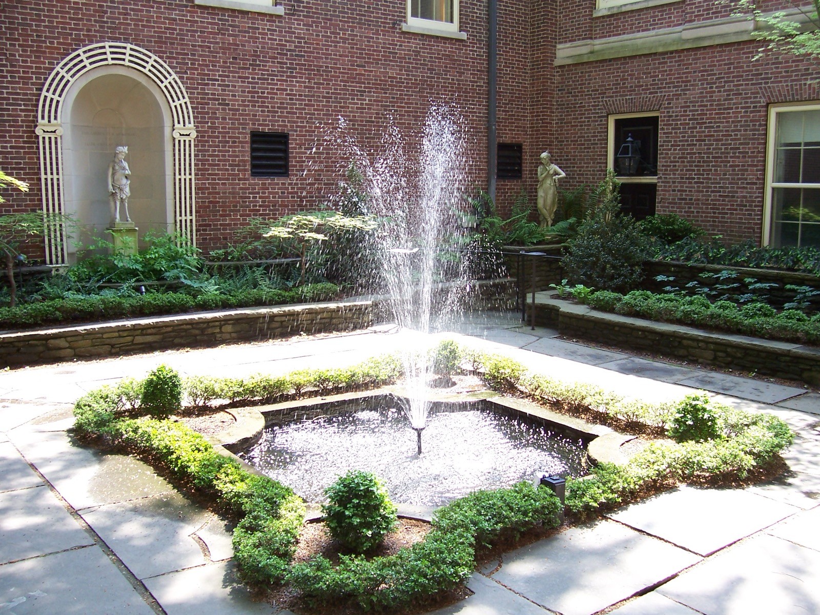 RISD Museum courtyard with fountain and brick museum buildings in Providence